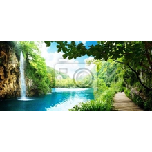 Фотообои с живописным водопадом и мостиком