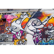 Фотография уличной стены граффити