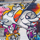 Фотография уличной стены граффити