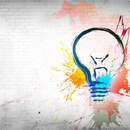 Кирпичная стена с рисунком лампочки (брызги краски)